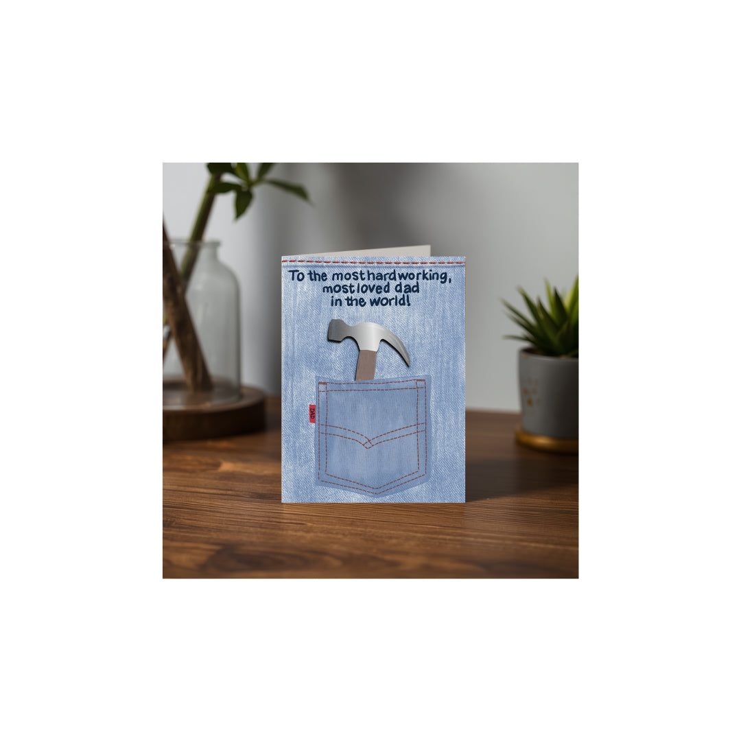 Fathers day card with denim design and message on a wooden surface
