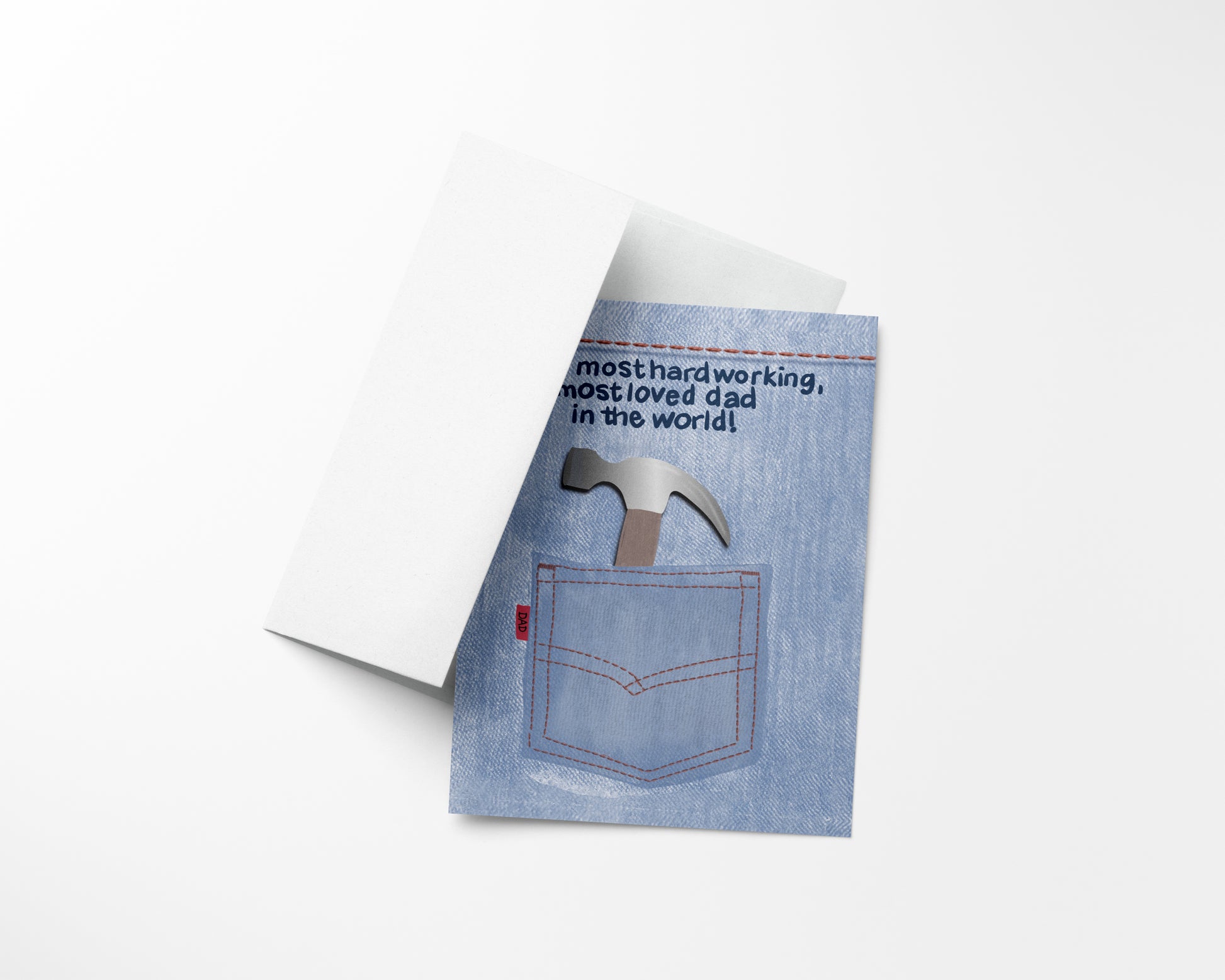 Greeting card for fathers day with denim pocket design and hammer graphic on a white background