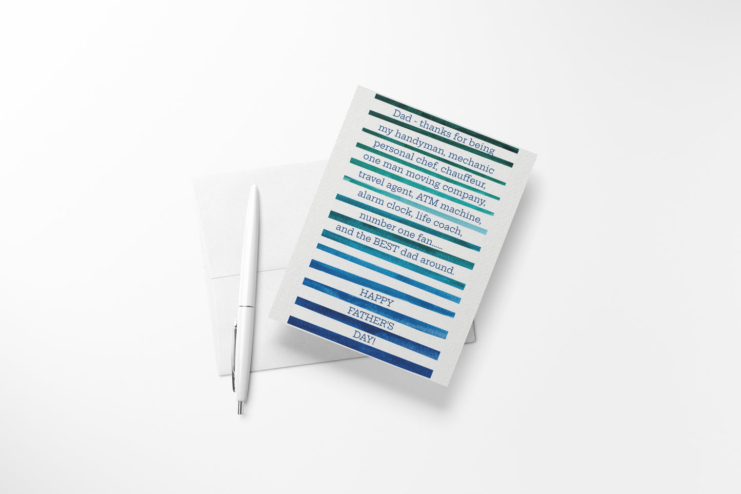 Funny Father's Day greeting card featuring bold teal and navy watercolor stripes and a heartfelt message for dad, styled with a pen and white envelope.