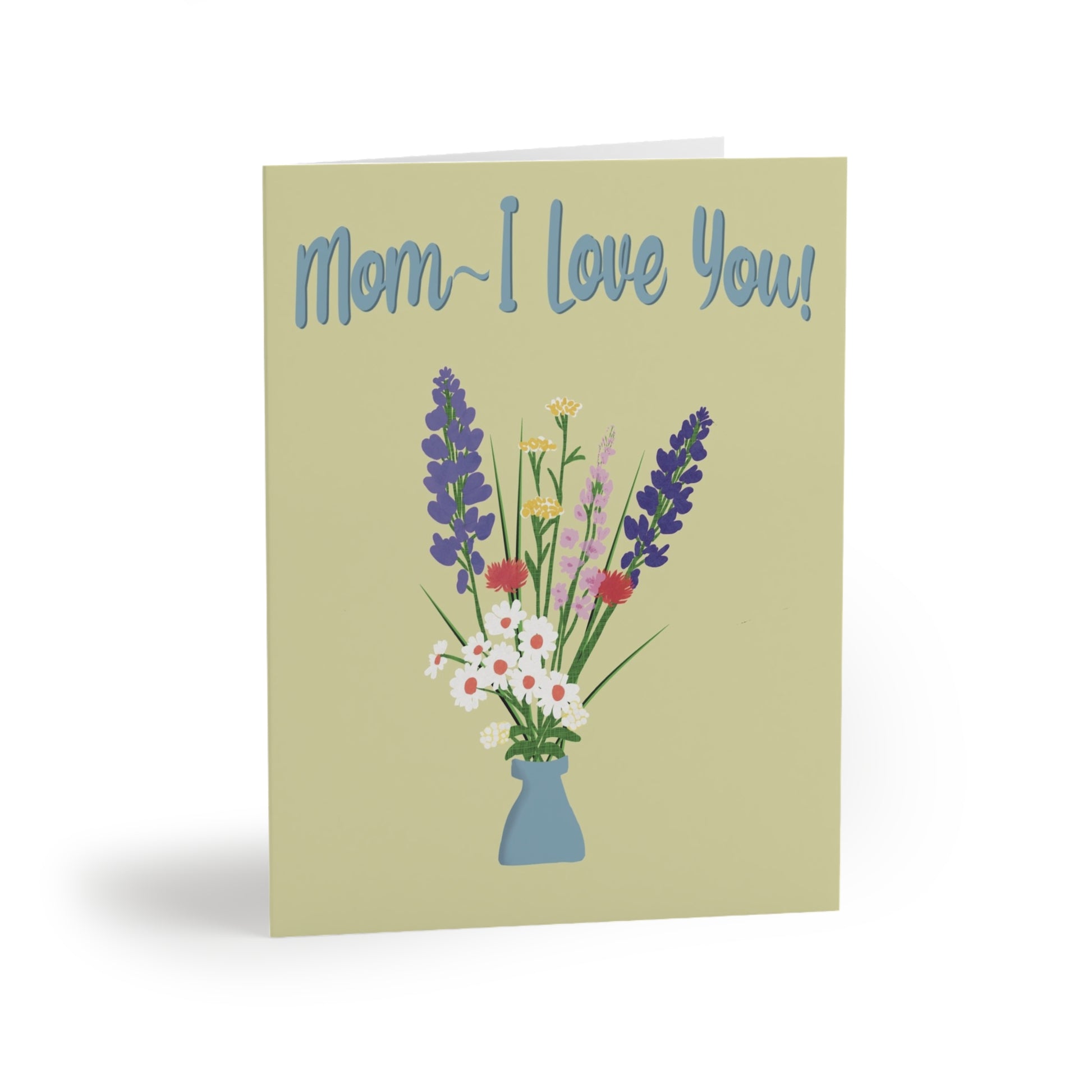 Light chartreuse greeting card, angled from the front left, displays a vase of colorful flowers and the text "Mom~ I Love You!”