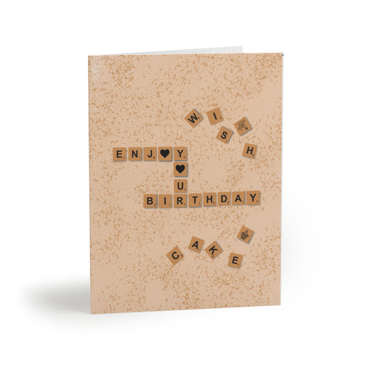 Front of Scrabble "Enjoy Your Birthday" A2 greeting card with brown, white, and yellow colors