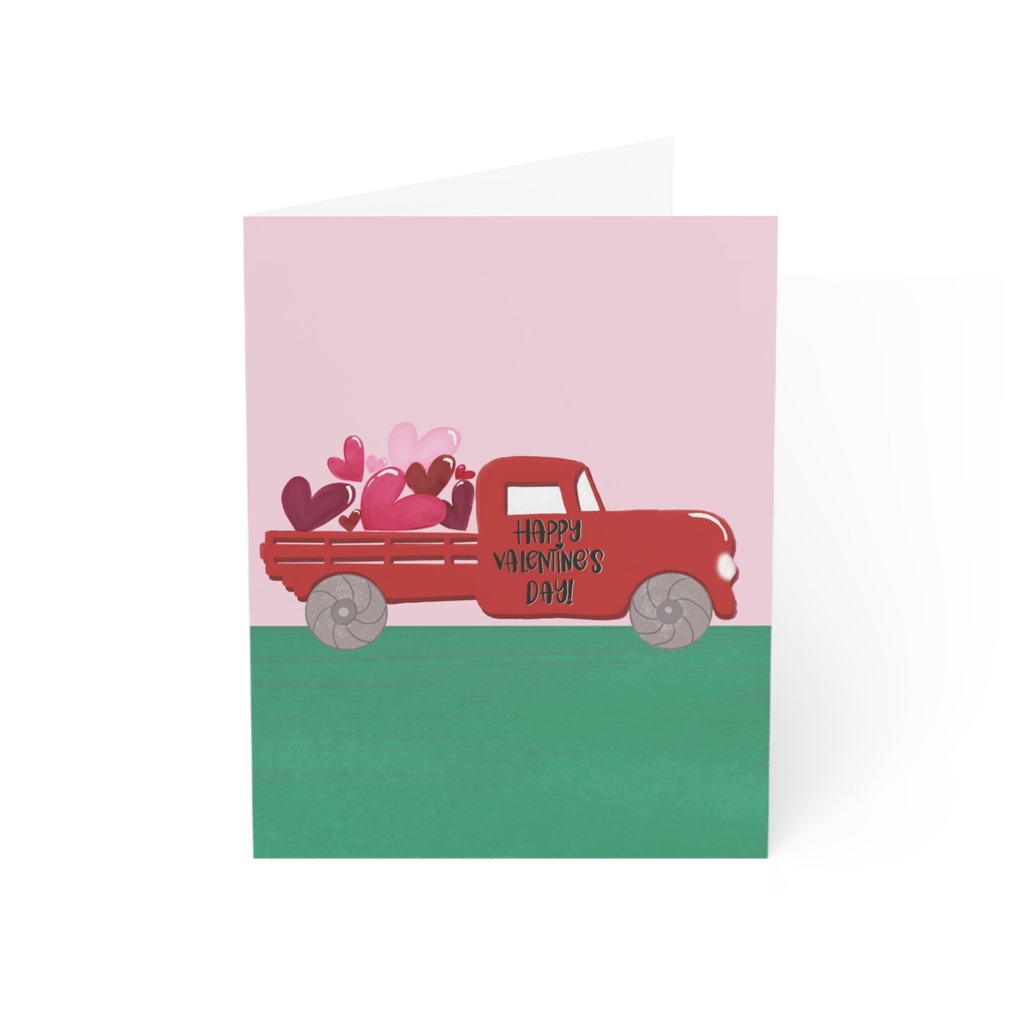 Valentine's Day card with a red truck and hearts on a pink and green background