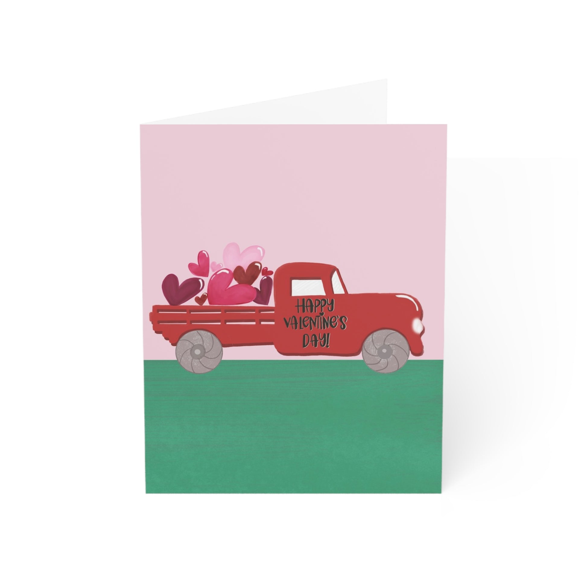 Valentine's Day card with a red truck and hearts on a pink and green background