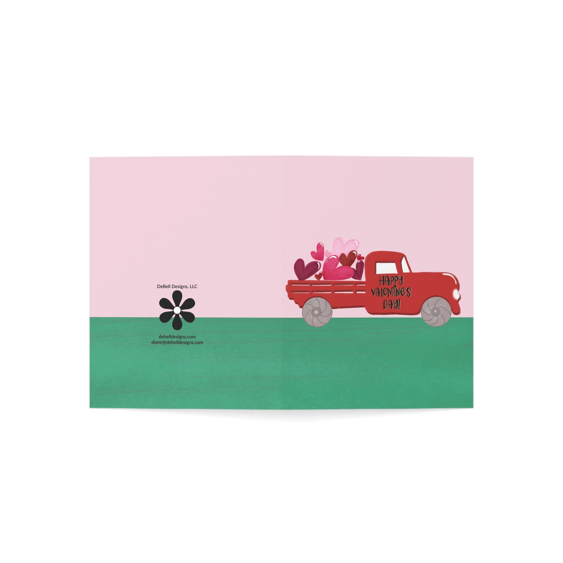 Card with a red truck carrying hearts on a pink and green background